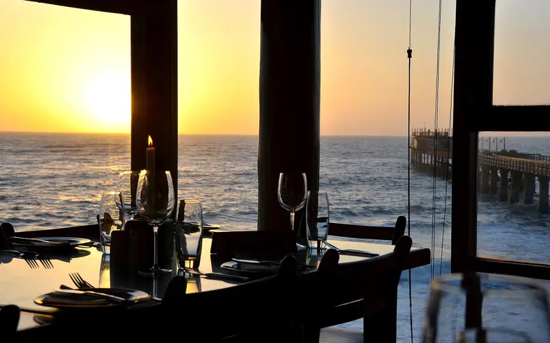 Sunset over the Atlantic seen from the restaurant on the Swakopmund jetty