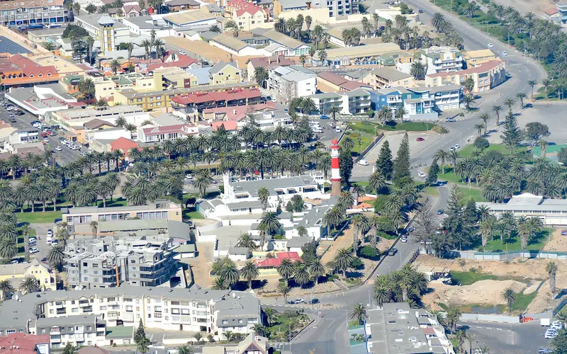 Aerial view of Swakopmund town centre around the lighthouse, with the Atlantic beyond