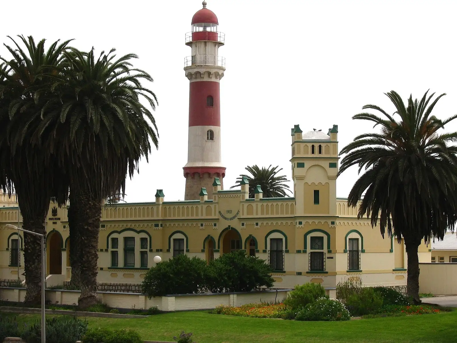 Swakopmund's lighthouse beside the former imperial district court, now the State House