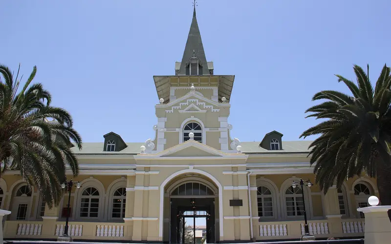 Grand facade of the Swakopmund Hotel & Entertainment Centre in the old railway station building